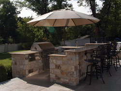 Natural Stone Outdoor Kitchen and Bluestone Patio